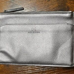 Women’s silver Halston wristlet